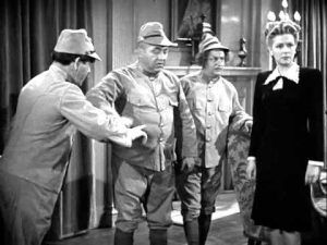 No Dough Boys - the Three Stooges, disguised as Japanese soldiers, are about to demonstrate jiujitsu to Christine McIntyre - and regret it!