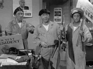 The Three Stooges as inept janitors in the first half of Three Dark Horses