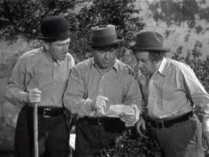 Shemp, Moe, and Larry as gardeners for Scotland Yard in The Hot Scots