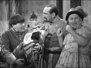 Moe Howard with baby, Major Filbert, and Curly in drag in "Uncivil Warriors"